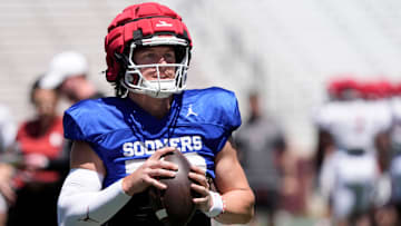 Oklahoma's John Mateer looks to throw a pass during the University of Oklahoma Sooners Crimson Combine at Gaylord Family - Oklahoma Memorial Stadium in Norman, Okla., Saturday, April, 12, 2025.