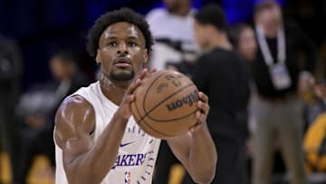 Apr 19, 2025; Los Angeles, California, USA;  Los Angeles Lakers guard Bronny James (9) warms up prior to the game against the Minnesota Timberwolves at Crypto.com Arena. Mandatory Credit: Jayne Kamin-Oncea-Imagn Images