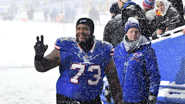Buffalo Bills offensive tackle Dion Dawkins eaves the field after winning a game against the San Francisco 49ers to clinch the AFC East title at Highmark Stadium. 