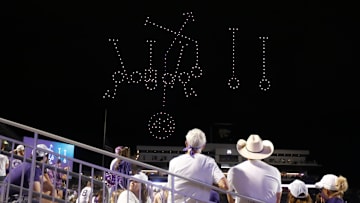 Fans watch a drone show following the game against Kansas.