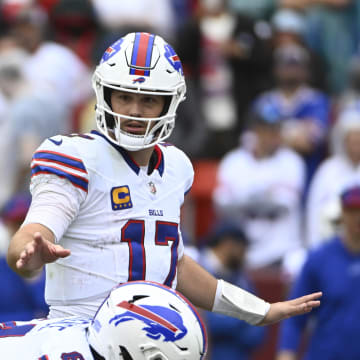 Sep 24, 2023; Landover, MD; Buffalo Bills quarterback Josh Allen (17) at the line of scrimmage against the Washington Commanders during the first half at FedExField. 