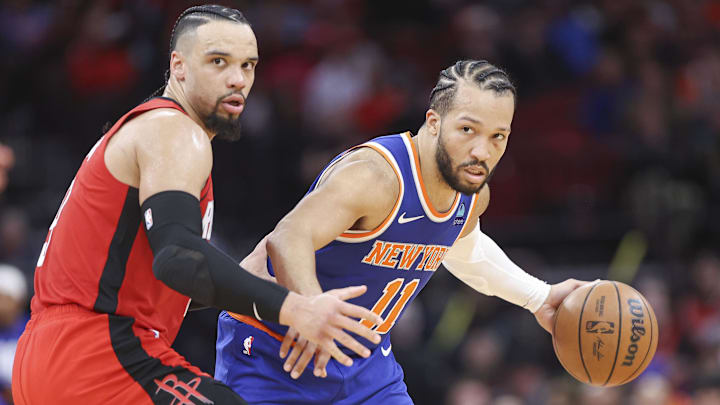 Feb 12, 2024; Houston, Texas, USA; New York Knicks guard Jalen Brunson (11) controls the ball as Houston Rockets forward Dillon Brooks (9) defends during the fourth quarter at Toyota Center. Mandatory Credit: Troy Taormina-USA TODAY Sports