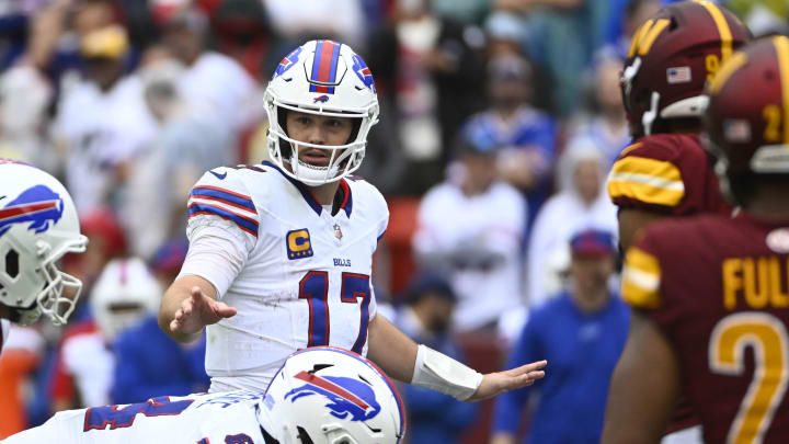 Sep 24, 2023; Landover, MD; Buffalo Bills quarterback Josh Allen (17) at the line of scrimmage against the Washington Commanders during the first half at FedExField. 