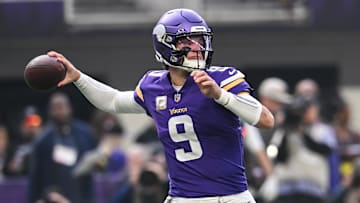 Nov 9, 2025; Minneapolis, Minnesota, USA; Minnesota Vikings quarterback J.J. McCarthy (9) throws a pass against the Baltimore Ravens during the first quarter at U.S. Bank Stadium.