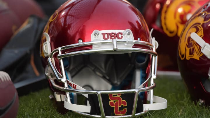 Oct 18, 2014; Los Angeles, CA, USA; A Southern California Trojans chrome homecoming helmet rest on the sidelines against the Colorado Buffaloes at Los Angeles Memorial Coliseum. Mandatory Credit: Kirby Lee-USA TODAY Sports

