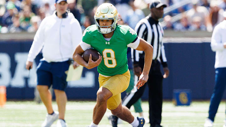 Notre Dame quarterback Kenny Minchey runs the ball during the Notre Dame Blue-Gold spring football game at Notre Dame Stadium on Saturday, April 12, 2025, in South Bend.