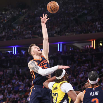 May 8, 2024; New York, New York, USA; New York Knicks center Isaiah Hartenstein (55) shoots over Indiana Pacers center Myles Turner (33) in the third quarter during game two of the second round for the 2024 NBA playoffs at Madison Square Garden. Mandatory Credit: Wendell Cruz-USA TODAY Sports