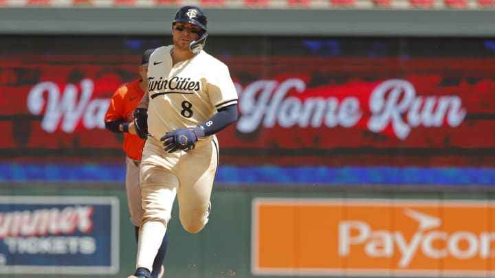 Jul 7, 2024; Minneapolis, Minnesota, USA; Minnesota Twins catcher Christian Vazquez (8) runs the bases on his game-winning home run against the Houston Astros in the ninth inning at Target Field.