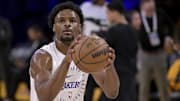 Apr 19, 2025; Los Angeles, California, USA;  Los Angeles Lakers guard Bronny James (9) warms up prior to the game against the Minnesota Timberwolves at Crypto.com Arena. Mandatory Credit: Jayne Kamin-Oncea-Imagn Images