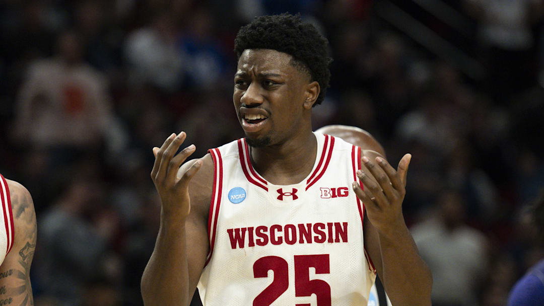Mar 19, 2026; Portland, OR, USA; Wisconsin Badgers guard Braeden Carrington (0) and guard John Blackwell (25) react during the second half of a first round game of the men's 2026 NCAA Tournament against the High Point Panthers at Moda Center. Mandatory Credit: Troy Wayrynen-Imagn Images