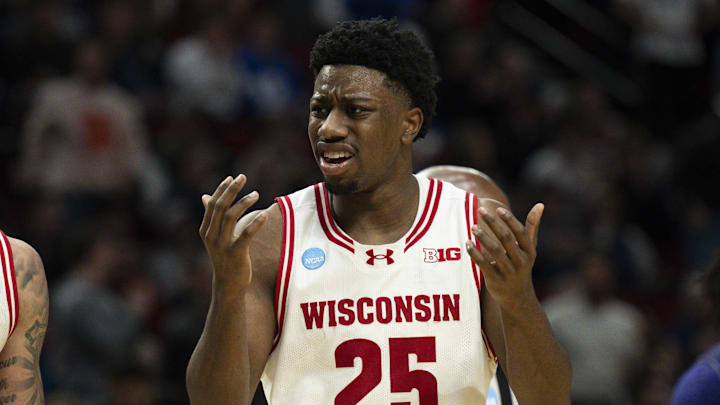 Mar 19, 2026; Portland, OR, USA; Wisconsin Badgers guard Braeden Carrington (0) and guard John Blackwell (25) react during the second half of a first round game of the men's 2026 NCAA Tournament against the High Point Panthers at Moda Center. Mandatory Credit: Troy Wayrynen-Imagn Images