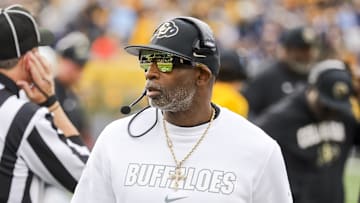 Buffaloes athletic director Rick George responded to a fan who claimed coach Deion Sanders is on the hot seat this year.