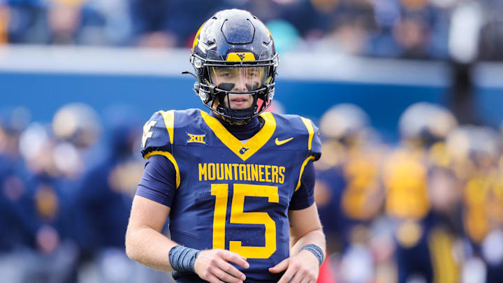 Nov 29, 2025; Morgantown, West Virginia, USA; West Virginia Mountaineers quarterback Scotty Fox Jr. (15) on the field during the second quarter against the Texas Tech Red Raiders at Milan Puskar Stadium. Mandatory Credit: Ben Queen-Imagn Images