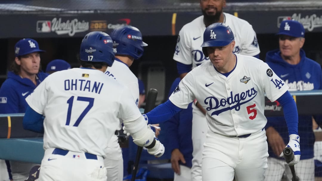 Oct 27, 2025; Los Angeles, California, USA; Los Angeles Dodgers designated hitter Shohei Ohtani (17) celebrates with first baseman Freddie Freeman (5) after hitting a home run during the third inning against the Toronto Blue Jays in game three of the 2025 MLB World Series at Dodger Stadium. Mandatory Credit: Kirby Lee-Imagn Images Oct 27, 2025; Los Angeles, California, USA; Los Angeles Dodgers designated hitter Shohei Ohtani (17) celebrates with first baseman Freddie Freeman (5) after hitting a home run during the third inning against the Toronto Blue Jays in game three of the 2025 MLB World Series at Dodger Stadium. Mandatory Credit: Kirby Lee-Imagn Images
