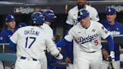 Oct 27, 2025; Los Angeles, California, USA; Los Angeles Dodgers designated hitter Shohei Ohtani (17) celebrates with first baseman Freddie Freeman (5) after hitting a home run during the third inning against the Toronto Blue Jays in game three of the 2025 MLB World Series at Dodger Stadium. Mandatory Credit: Kirby Lee-Imagn Images