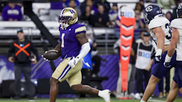 Sep 6, 2025; Seattle, Washington, USA; Washington Huskies running back Jonah Coleman (1) rushes for a touchdown against the UC Davis Aggies during the first quarter at Husky Stadium. Mandatory Credit: Joe Nicholson-Imagn Images