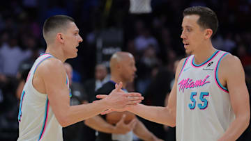 Jan 27, 2025; Miami, Florida, USA; Miami Heat guard Tyler Herro (14) and forward Duncan Robinson (55) celebrate after the game against the Orlando Magic at Kaseya Center. Mandatory Credit: Sam Navarro-Imagn Images