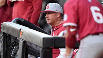 Oklahoma coach Skip Johnson watches from the dugout during a college Bedlam baseball game between the University of Oklahoma Sooners (OU) and the Oklahoma State University Cowboys (OSU) at O'Brate Stadium in Stillwater, Okla., Tuesday, April 15, 2025.