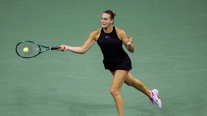 Sep 5, 2024; Flushing, NY, USA; Aryna Sabalenka of Belarus hits the ball to Emma Navarro of the United States on day eleven of the U.S. Open tennis tournament at the USTA Billie Jean King National Tennis Center. Mandatory Credit: Mike Frey-Imagn Images 