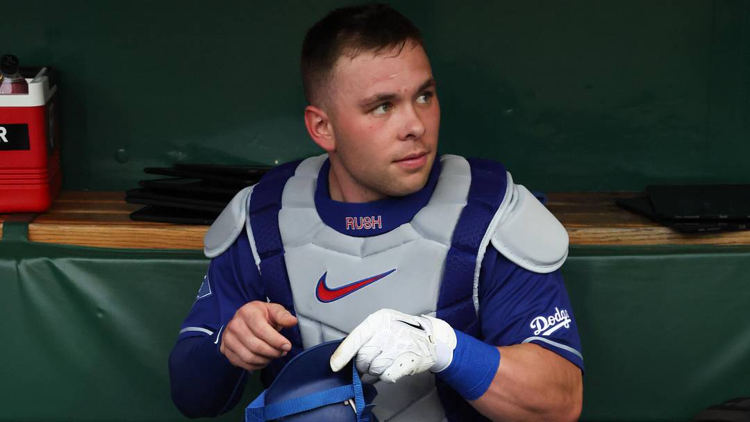 Jun 11, 2026; Pittsburgh, Pennsylvania, USA;  Los Angeles Dodgers catcher Dalton Rushing (68) prepares in the dugout before the game against the Pittsburgh Pirates at PNC Park. Mandatory Credit: Charles LeClaire-Imagn Images