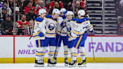 Nov 19, 2023; Chicago, Illinois, USA; Buffalo Sabres defenseman Rasmus Dahlin (26) celebrates his goal with teammates against the Chicago Blackhawks during the first period at the United Center. Mandatory Credit: Daniel Bartel-Imagn Images