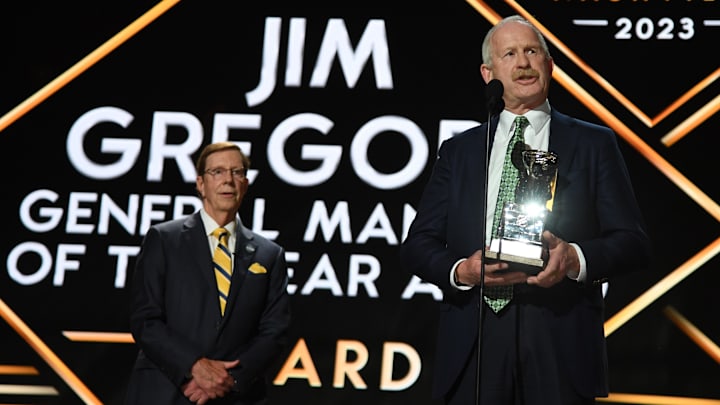 Jun 28, 2023; Nashville, Tennessee, USA; Dallas Stars general manager Jim Nill is awarded the Jim Gregory General Manager of the Year award by Nashville Predators general manager David Poile during the first round of the 2023 NHL Draft at Bridgestone Arena. Mandatory Credit: Christopher Hanewinckel-Imagn Images Jun 28, 2023; Nashville, Tennessee, USA; Dallas Stars general manager Jim Nill is awarded the Jim Gregory General Manager of the Year award by Nashville Predators general manager David Poile during the first round of the 2023 NHL Draft at Bridgestone Arena. Mandatory Credit: Christopher Hanewinckel-Imagn Images