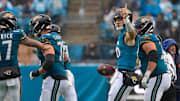 Jacksonville Jaguars quarterback Trevor Lawrence (16) signals a first down during the fourth quarter of an NFL football game at EverBank Stadium, Sunday, Dec. 7, 2025, in Jacksonville, Fla. The Jaguars defeated the Colts 36-19. [Corey Perrine/Florida Times-Union]