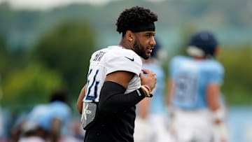 Tennessee Titans safety Mike Brown stretches during an NFL training camp practice at Ascension Saint Thomas Sports Park 