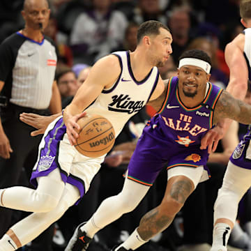 Mar 14, 2025; Phoenix, Arizona, USA; Sacramento Kings guard Zach LaVine (8) dribbles the ball against Phoenix Suns guard Bradley Beal (3) during the first half at Footprint Center. Mandatory Credit: Mark J. Rebilas-Imagn Images