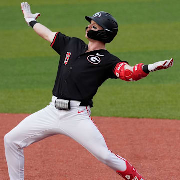 Georgia outfielder Nolan McCarthy (19) celebrates after stealing second during a NCAA baseball game against Texas A&M in Athens, Ga., on Friday, May 16, 2025.