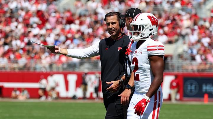 Sep 13, 2025; Tuscaloosa, Alabama, USA; Wisconsin Badgers head coach Luke Fickell discusses a call with an official during the second quarter against the Alabama Crimson Tide at Saban Field at Bryant-Denny Stadium. Mandatory Credit: David Leong-Imagn Images