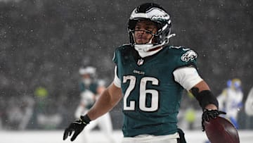Jan 19, 2025; Philadelphia, Pennsylvania, USA; Philadelphia Eagles running back Saquon Barkley (26) celebrates after scoring a touchdown against the Los Angeles Rams in the second half in a 2025 NFC divisional round game at Lincoln Financial Field. Mandatory Credit: Eric Hartline-Imagn Images