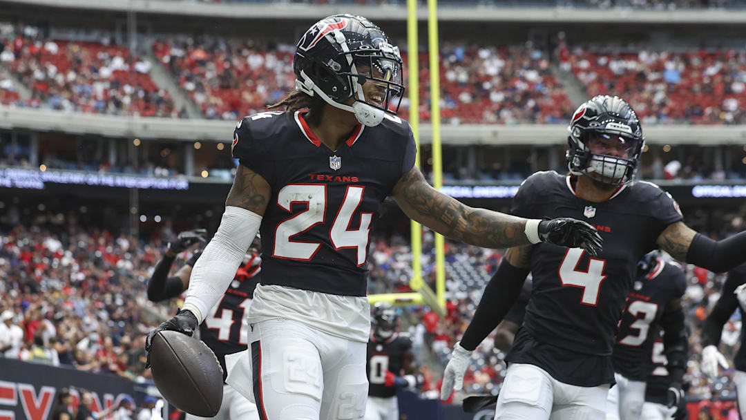 Aug 17, 2024; Houston, Texas, USA; Houston Texans cornerback Derek Stingley Jr. (24) celebrates after an interception during the first quarter against the New York Giants at NRG Stadium. Mandatory Credit: Troy Taormina-Imagn Images