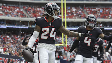 Aug 17, 2024; Houston, Texas, USA; Houston Texans cornerback Derek Stingley Jr. (24) celebrates after an interception during the first quarter against the New York Giants at NRG Stadium. Mandatory Credit: Troy Taormina-Imagn Images