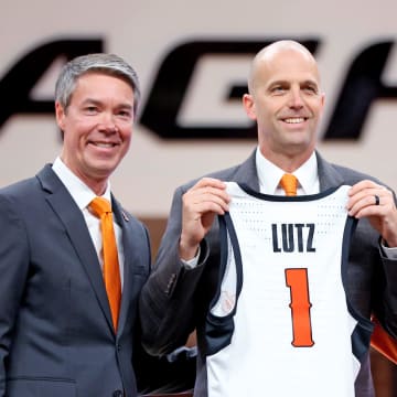 Oklahoma State Vice President and Athletic Director Chad Weiberg and President Dr. Kayse Shrum introduce head men's basketball coach Steve Lutz during an introduction ceremony of the at Gallagher-Iba Arena in Stillwater, Okla., Thursday, April 4, 2024.