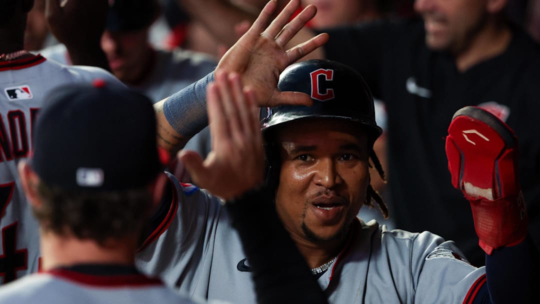 Sep 20, 2025; Minneapolis, Minnesota, USA; Cleveland Guardians third baseman Jose Ramirez (11) celebrates after scoring against the Minnesota Twins during the fifth inning of game two of a double header at Target Field. Mandatory Credit: Matt Krohn-Imagn Images