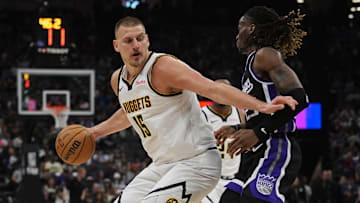 Denver Nuggets center Nikola Jokic controls the ball against Sacramento Kings guard Keon Ellis during the second quarter at Golden 1 Center. 