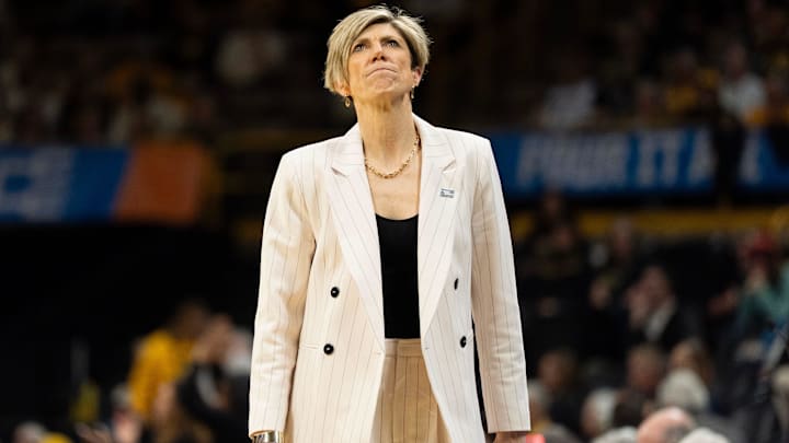 Iowa head coach Jan Jensen reacts late in double overtime against the Virginia Cavaliers March 23, 2026 during a Round of 32 NCAA March Madness game at Carver-Hawkeye Arena in Iowa City, Iowa.