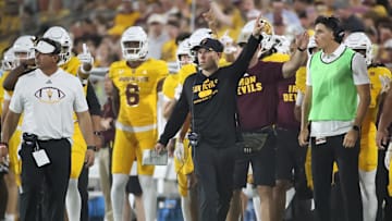 Head Coach Kenny Dillingham of the Arizona State Sun Devils signals a first down after the Sun Devils complete the first down during the Mississippi State Bulldogs versus the Arizona State Sun Devils football game at Mountain America Stadium on September 7, 2024 in Tempe, Arizona.