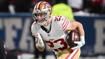 Dec 1, 2024; Orchard Park, New York, USA; San Francisco 49ers running back Christian McCaffrey (23) warms up before a game against the Buffalo Bills at Highmark Stadium. Mandatory Credit: Mark Konezny-Imagn Images