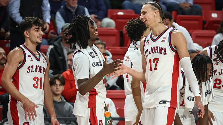 Nov 20, 2025; Queens, New York, USA; St. John's Red Storm forward Ruben Prey (17) is greeted by guards Ian Jackson (11) and Lefteris Liotopoulos (31) in the second half against the Bucknell Bison at Carnesecca Arena. Mandatory Credit: Wendell Cruz-Imagn Images Nov 20, 2025; Queens, New York, USA; St. John's Red Storm forward Ruben Prey (17) is greeted by guards Ian Jackson (11) and Lefteris Liotopoulos (31) in the second half against the Bucknell Bison at Carnesecca Arena. Mandatory Credit: Wendell Cruz-Imagn Images