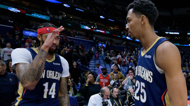 Dec 28, 2023; New Orleans, Louisiana, USA;  New Orleans Pelicans forward Brandon Ingram (14) salutes New Orleans Pelicans guard Trey Murphy III (25) after defeating the Utah Jazz at the Smoothie King Center. 