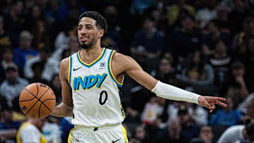 Apr 2, 2025; Indianapolis, Indiana, USA; Indiana Pacers guard Tyrese Haliburton (0) dribbles the ball in the second half against the Charlotte Hornets at Gainbridge Fieldhouse. Mandatory Credit: Trevor Ruszkowski-Imagn Images