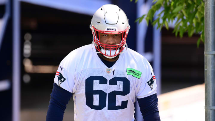 Jun 10, 2024; Foxborough, MA, USA; New England Patriots guard Sidy Sow (62) walks to the practice fields for minicamp at Gillette Stadium. Mandatory Credit: Eric Canha-USA TODAY Sports