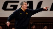 Feb 25, 2024; Stillwater, Okla, USA; Iowa  s head coach Tom Brand reacts on the mat during wrestling match against Oklahoma State in Gallagher Iba Arena. Mandatory Credit: Mitch Alcala-The Oklahoman