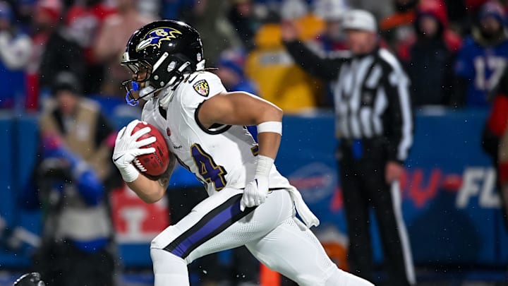 Jan 19, 2025; Orchard Park, New York, USA; Baltimore Ravens running back Keaton Mitchell (34) returns a kickoff against the Buffalo Bills in the fourth quarter of a 2025 AFC divisional round game against the Buffalo Bills at Highmark Stadium. Mandatory Credit: Mark Konezny-Imagn Images Jan 19, 2025; Orchard Park, New York, USA; Baltimore Ravens running back Keaton Mitchell (34) returns a kickoff against the Buffalo Bills in the fourth quarter of a 2025 AFC divisional round game against the Buffalo Bills at Highmark Stadium. Mandatory Credit: Mark Konezny-Imagn Images