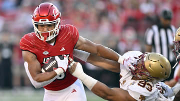 Sep 23, 2023; Louisville, Kentucky, USA;  Louisville Cardinals running back Isaac Guerendo (23) runs the ball against Boston College Eagles defensive tackle Owen Stoudmire (93) during the second half at L&N Federal Credit Union Stadium.