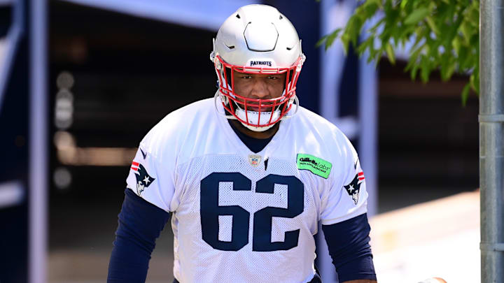 Jun 10, 2024; Foxborough, MA, USA; New England Patriots guard Sidy Sow (62) walks to the practice fields for minicamp at Gillette Stadium. Mandatory Credit: Eric Canha-Imagn Images