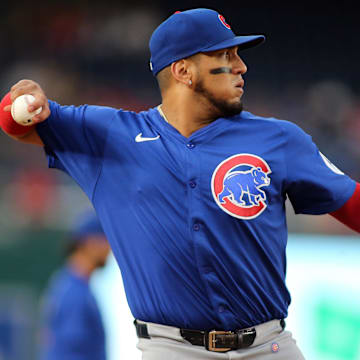 Aug 30, 2024; Washington, District of Columbia, USA; Chicago Cubs third base Isaac Paredes (17) throws to first base during the first inning against the Washington Nationals at Nationals Park.