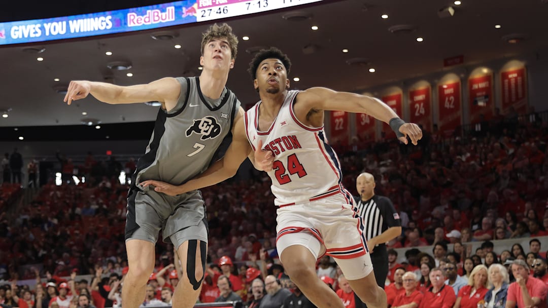 Feb 28, 2026; Houston, Texas, USA;  Colorado Buffaloes forward Sebastian Rancik (7) tries to block out Houston Cougars forward Chase McCarty (24) in the second  half at Fertitta Center. Mandatory Credit: Thomas Shea-Imagn Images